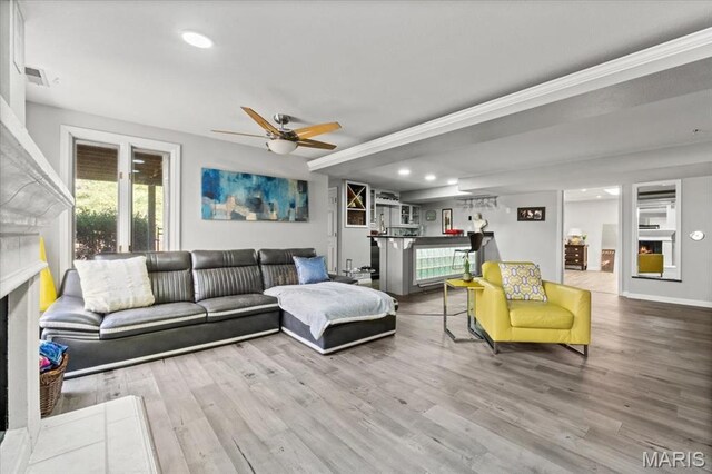 1909 Shepard Rd, Wildwood, MO 63038 - living room featuring a fireplace, wood finished floors, a ceiling fan, recessed lighting, and baseboards