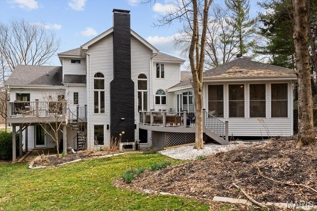 1909 Shepard Rd, Wildwood, MO 63038 - rear view of property with stairs, a sunroom, a wooden deck, and a chimney