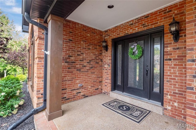 13552 Weston Park Dr, Saint Louis, MO 63131 - view of exterior entry with brick siding and french doors