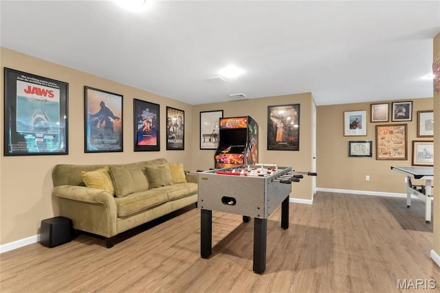 13552 Weston Park Dr, Saint Louis, MO 63131 - recreation room with wood finished floors and baseboards