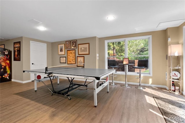 13552 Weston Park Dr, Saint Louis, MO 63131 - rec room featuring wood finished floors, baseboards, and recessed lighting