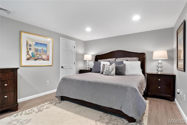 13552 Weston Park Dr, Saint Louis, MO 63131 - bedroom featuring wood finished floors, baseboards, and recessed lighting