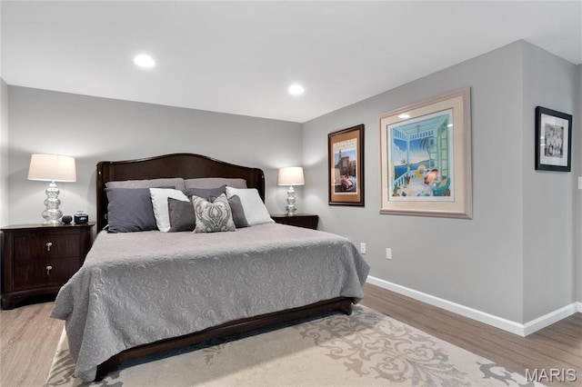 13552 Weston Park Dr, Saint Louis, MO 63131 - bedroom with baseboards, wood finished floors, and recessed lighting