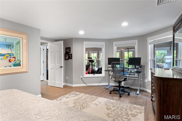 13552 Weston Park Dr, Saint Louis, MO 63131 - bedroom with wood finished floors, baseboards, recessed lighting, and an office area