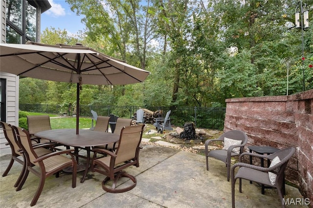 13552 Weston Park Dr, Saint Louis, MO 63131 - view of patio / terrace with outdoor dining area and a fenced backyard