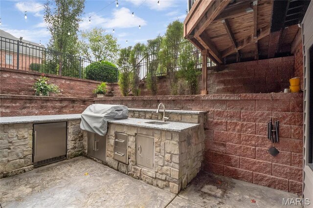 13552 Weston Park Dr, Saint Louis, MO 63131 - view of patio / terrace featuring a sink, a grill, area for grilling, and fence