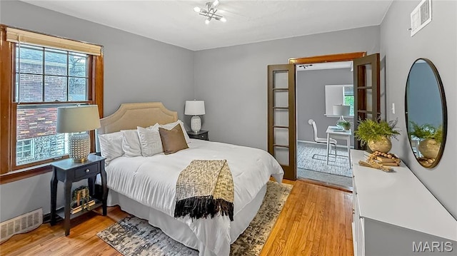 4411 Nelson Dr, Saint Louis, MO 63121 - bedroom with light wood-type flooring