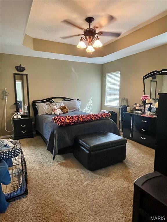 22880 Return Ln, Waynesville, MO 65583 - bedroom with a raised ceiling, light carpet, and a ceiling fan