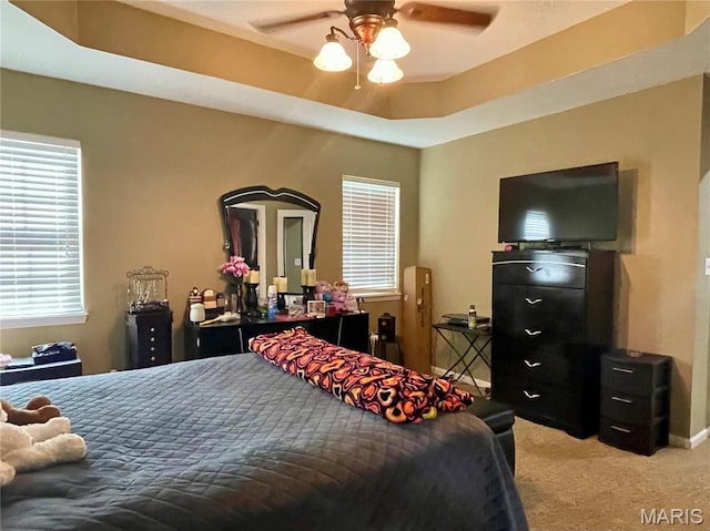 22880 Return Ln, Waynesville, MO 65583 - bedroom with light colored carpet, a ceiling fan, and baseboards