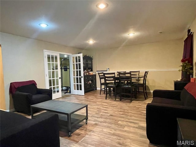 22880 Return Ln, Waynesville, MO 65583 - living area featuring french doors, light wood-style flooring, recessed lighting, and baseboards
