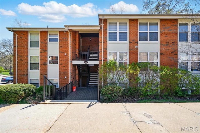 view of property with stairs