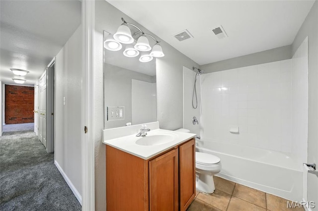 bathroom featuring vanity, toilet, and shower / bath combination