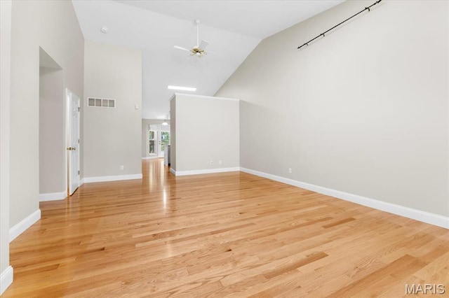 1136 Arbor Place Dr, Manchester, MO 63088 - unfurnished living room featuring high vaulted ceiling, light wood finished floors, and ceiling fan