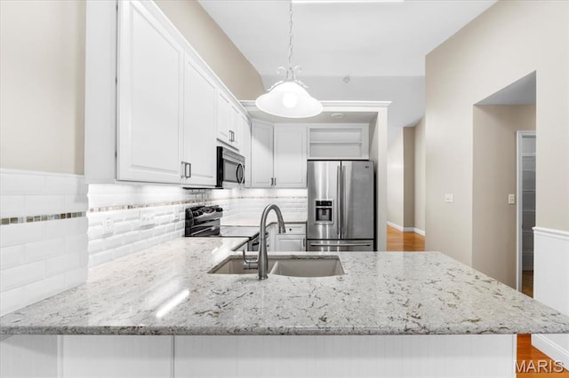 1136 Arbor Place Dr, Manchester, MO 63088 - kitchen with stainless steel appliances, tasteful backsplash, and white cabinets