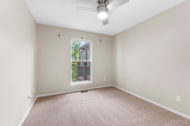 1136 Arbor Place Dr, Manchester, MO 63088 - spare room featuring carpet and ceiling fan