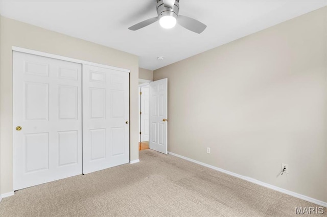 1136 Arbor Place Dr, Manchester, MO 63088 - unfurnished bedroom featuring light colored carpet, a closet, and ceiling fan