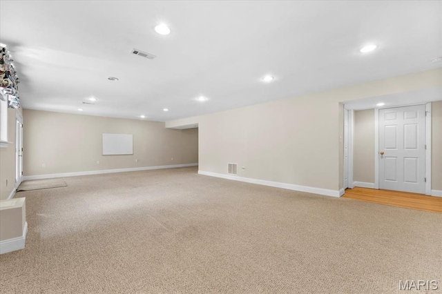 1136 Arbor Place Dr, Manchester, MO 63088 - finished basement with recessed lighting and light carpet
