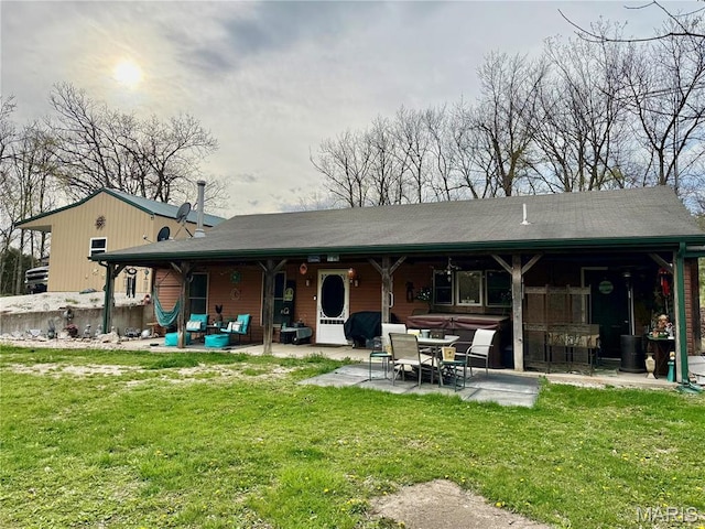 42 Berger Rd, Middletown, MO 63359 - rear view of house featuring a patio and a yard