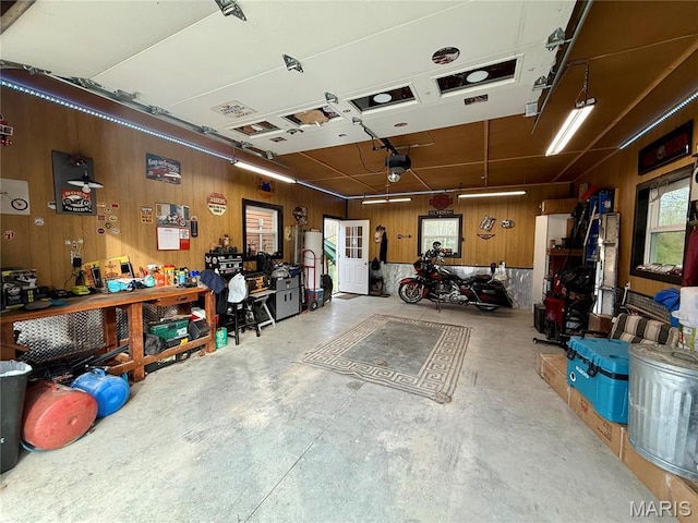 42 Berger Rd, Middletown, MO 63359 - garage featuring a workshop area and wood walls