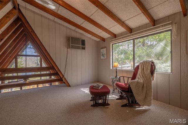 living area featuring a wall unit AC, wooden walls, and carpet flooring