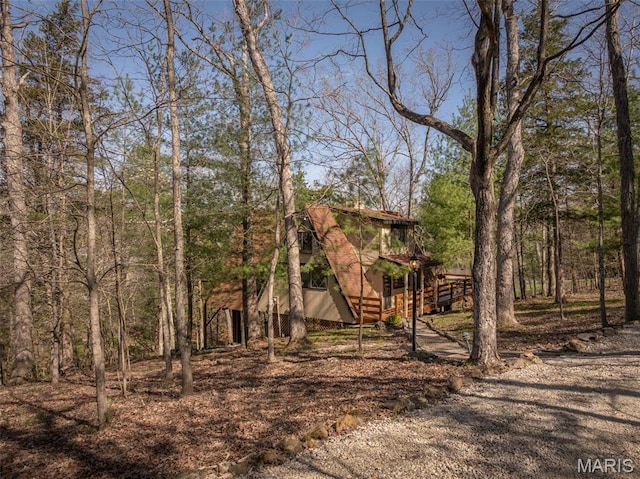 view of front of home featuring stairs