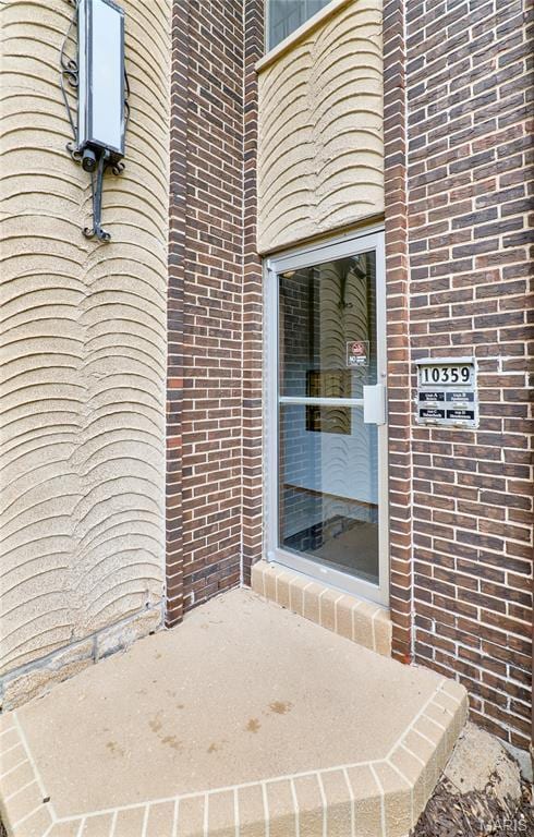 10359 Corbeil Dr Unit D, Saint Louis, MO 63146 - entrance to property with brick siding