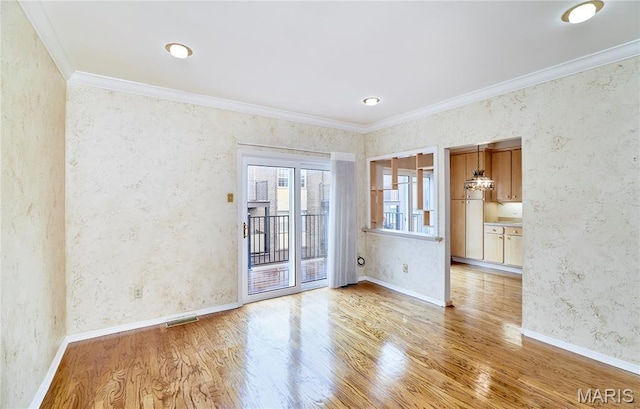 10359 Corbeil Dr Unit D, Saint Louis, MO 63146 - empty room with light wood-style floors, crown molding, wallpapered walls, and baseboards