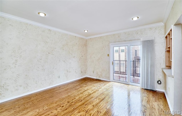 10359 Corbeil Dr Unit D, Saint Louis, MO 63146 - spare room featuring wood finished floors, wallpapered walls, ornamental molding, baseboards, and recessed lighting