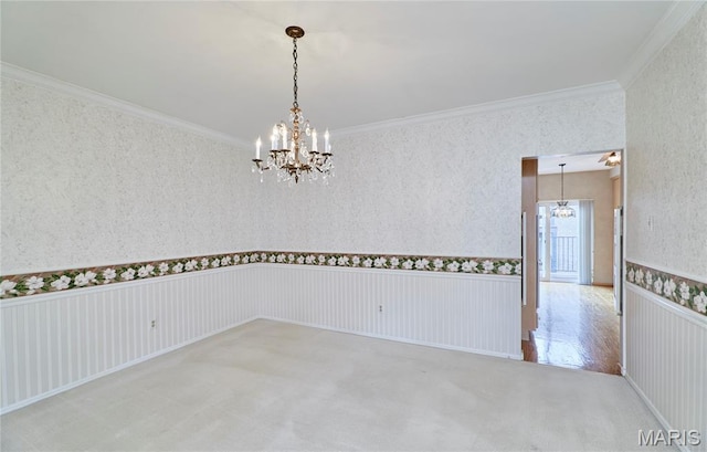 10359 Corbeil Dr Unit D, Saint Louis, MO 63146 - carpeted empty room featuring a chandelier, crown molding, and wallpapered walls