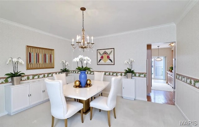 10359 Corbeil Dr Unit D, Saint Louis, MO 63146 - dining room with a chandelier, crown molding, and a wainscoted wall