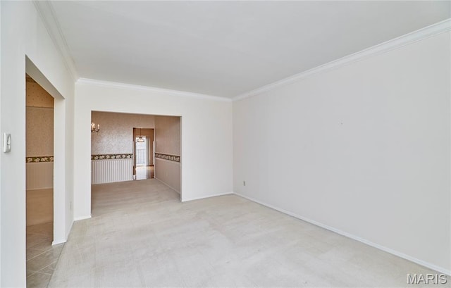 10359 Corbeil Dr Unit D, Saint Louis, MO 63146 - unfurnished room featuring crown molding, baseboards, and a chandelier