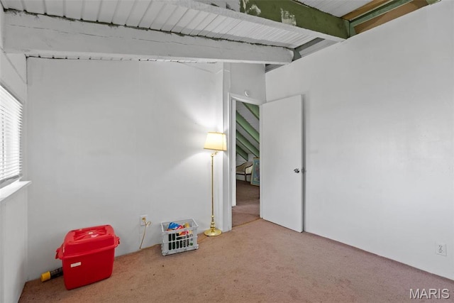 2797 Dawnview Dr, Florissant, MO 63031 - unfurnished bedroom with carpet flooring and beam ceiling
