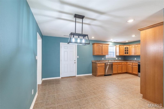 1501 Vincent St, Poplar Bluff, MO 63901 - kitchen featuring appliances with stainless steel finishes, baseboards, glass insert cabinets, brown cabinetry, and recessed lighting