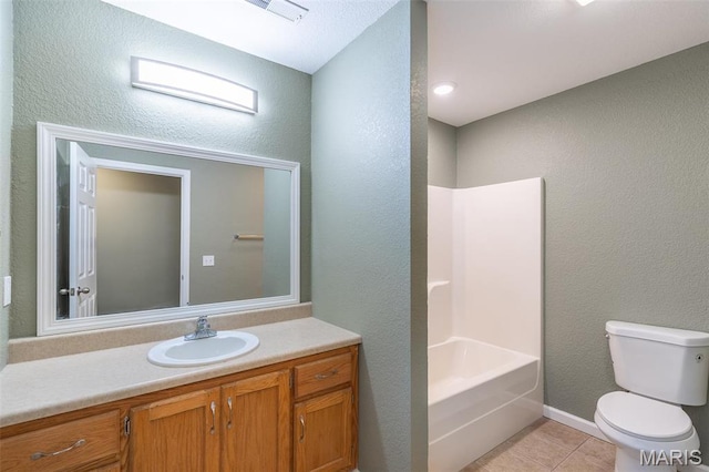 1501 Vincent St, Poplar Bluff, MO 63901 - full bathroom featuring toilet, a textured wall, tile patterned flooring, vanity, and shower / tub combination
