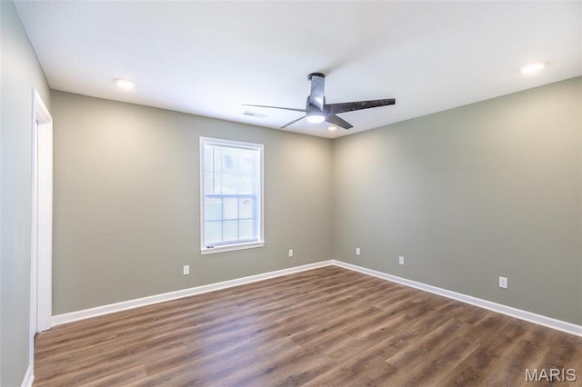 1501 Vincent St, Poplar Bluff, MO 63901 - unfurnished room with ceiling fan, dark wood finished floors, baseboards, and recessed lighting