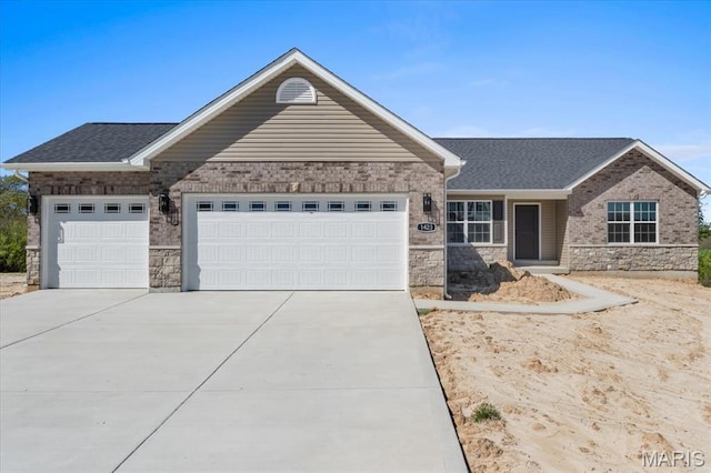 1423 Wild Ridge Estates Ct, Florissant, MO 63033 - ranch-style home featuring concrete driveway, a garage, stone siding, and a shingled roof