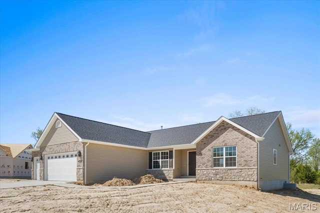 1423 Wild Ridge Estates Ct, Florissant, MO 63033 - ranch-style house with stone siding and a garage