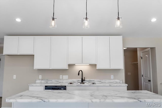 1423 Wild Ridge Estates Ct, Florissant, MO 63033 - kitchen with a sink, dishwasher, white cabinets, pendant lighting, and recessed lighting