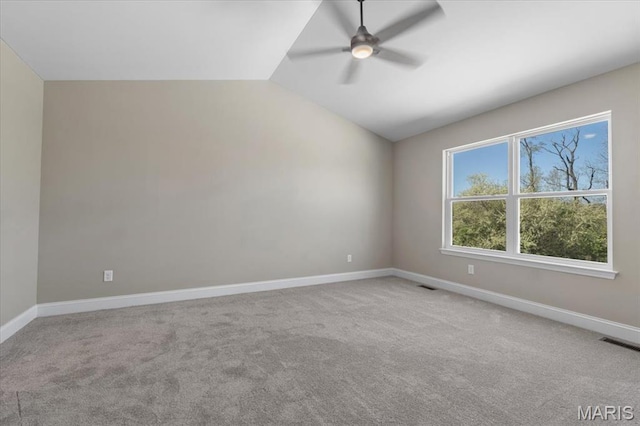 1423 Wild Ridge Estates Ct, Florissant, MO 63033 - carpeted empty room with a ceiling fan, lofted ceiling, and baseboards
