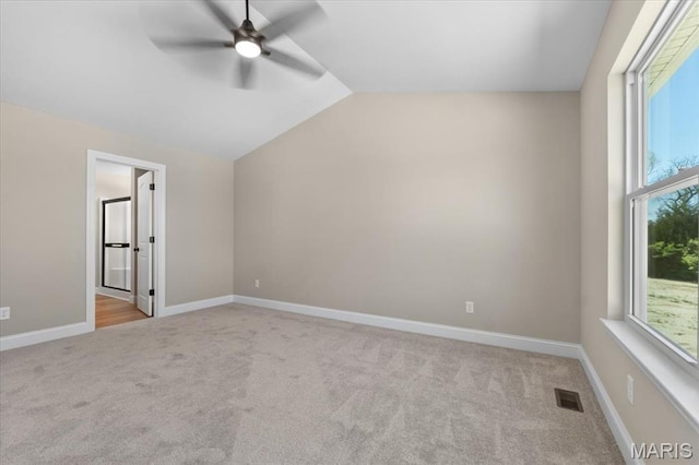 1423 Wild Ridge Estates Ct, Florissant, MO 63033 - additional living space with a ceiling fan, carpet flooring, lofted ceiling, and baseboards