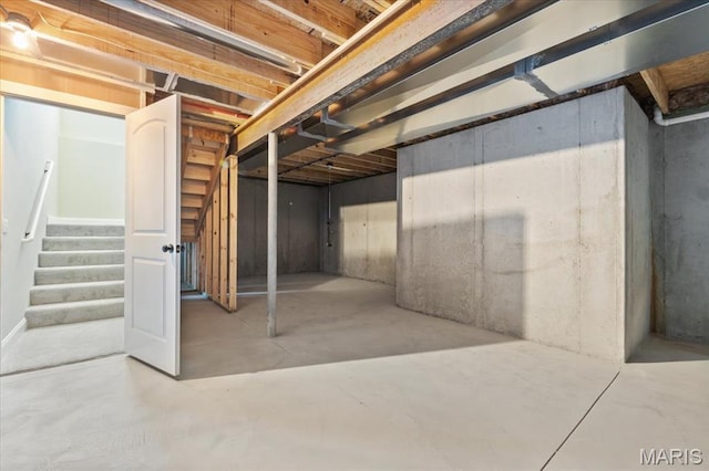 1423 Wild Ridge Estates Ct, Florissant, MO 63033 - unfinished basement featuring stairs