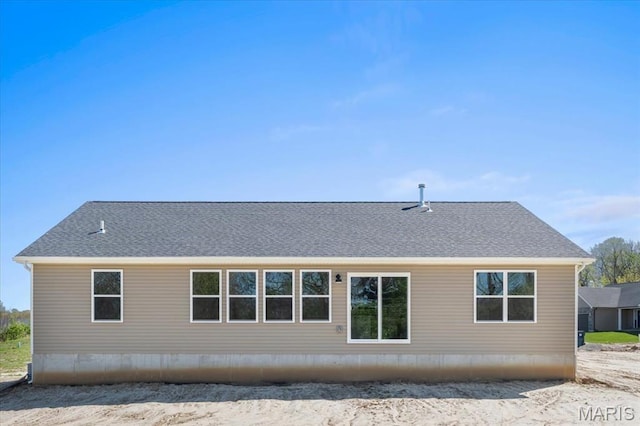 1423 Wild Ridge Estates Ct, Florissant, MO 63033 - back of property featuring a shingled roof