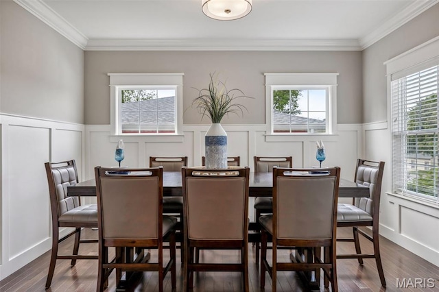 11910 Lillian Ave, Saint Louis, MO 63131 - dining area featuring plenty of natural light, a decorative wall, wainscoting, and dark wood-style floors