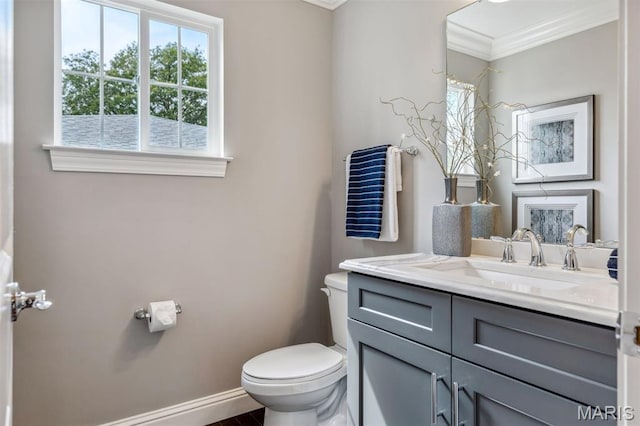 11910 Lillian Ave, Saint Louis, MO 63131 - bathroom featuring toilet, crown molding, baseboards, vanity, and wood finished floors