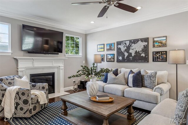 11910 Lillian Ave, Saint Louis, MO 63131 - living room featuring ceiling fan, ornamental molding, a high end fireplace, wood finished floors, and recessed lighting
