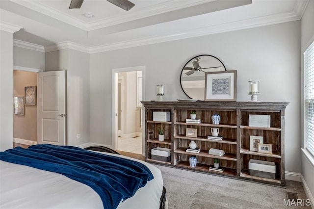 11910 Lillian Ave, Saint Louis, MO 63131 - bedroom featuring ornamental molding, baseboards, a tray ceiling, ensuite bath, and carpet floors