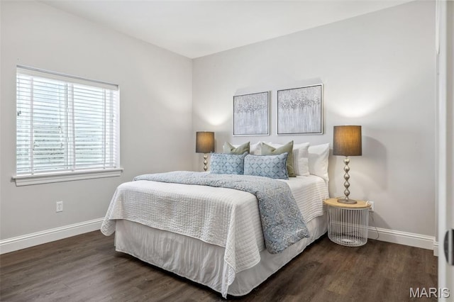 11910 Lillian Ave, Saint Louis, MO 63131 - bedroom with baseboards and wood finished floors