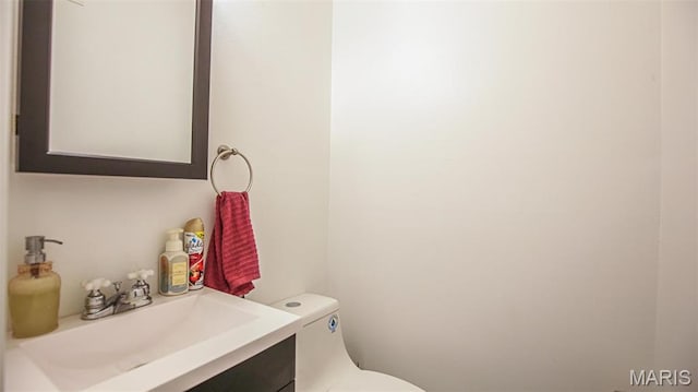 14153 Spring Dr, De Soto, MO 63020 - bathroom featuring toilet and vanity