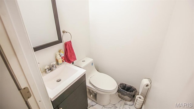 14153 Spring Dr, De Soto, MO 63020 - bathroom with vanity, marble look tiles, and toilet
