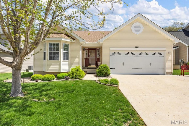 view of front of home with an attached garage, driveway, a front lawn, cooling unit, and a shingled roof